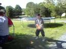 4 retards playin with fire a tennis ball and a skateboard