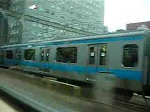 E233京浜東北線 併走から抜かれる