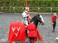 dominic sewell strikes steve mallett really hard hit on the second day of the 2007 queen's jubilee trophy joust at the royal armouries leeds. this is a brilliant example of professionalism amongst the foot crew, showing calm and control in a potentially adverses situation.  �2007 gwen nowrick-- all rights reserved.