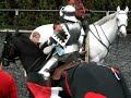 dominic sewell strikes steve mallett really hard hit on the second day of the 2007 queen's jubilee trophy joust at the royal armouries leeds. this is a brilliant example of professionalism amongst the foot crew, showing calm and control in a potentially adverses situation.  �2007 gwen nowrick-- all rights reserved.