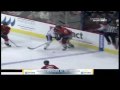 Andrew Ladd throws a big hit against Matt D'Agostini