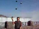 Louie juggles in front of Niagara Falls