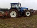 tractor wheelie ploughing