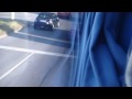 ferrari driving away