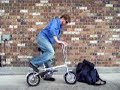 Demo of the 22.5 lb E-Z Pack Folding Bike, an aluminum bike that folds that sells for $179 including the carry bag and shipping (within the US lower 48 states).

The E-Z Pack is outfitted with a dual crank drive system; the result is that speed and pedal cadence are similar to that of full size single speed bikes. Other standard features of the E-Z Pack are alloy fenders, alloy rear carry rack, kickstand, bike bell and carry bag.