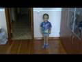 Denis walks after  treatment of achondroplasia