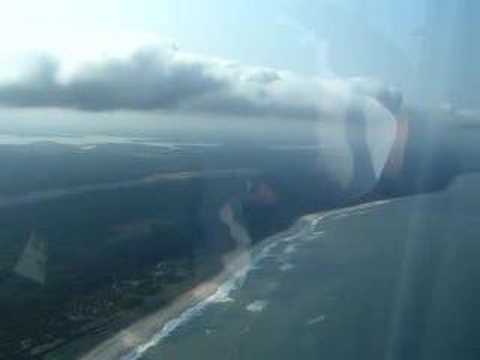 Flying along the coast in Gabon, ...