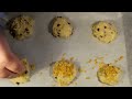 Nicko's Bakery NICKO'S DAILY VIDEO DIARY www.youtube.com TWITTER: www.twitter.com FACEBOOK: www.facebook.com NICKO'S T-SHIRTS www.zazzle.com.au Ingredients: 125g butter 2/3 cup brown sugar 1 tsp vanilla extract 2 eggs 1 & 1/3 cups SR flour 1/2 cup choc chips 1 cup cornflakes ENJOY! ~ Nicko Music from Nicko's Kitchen is from www.incompetech.com Used with permission