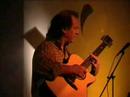 Solo performance by Giovanni Palombo (acoustic guitar)