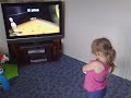 Elissa playing wii bowling aged 4