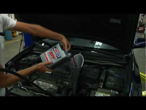 how to drain transmission fluid without dropping the pan