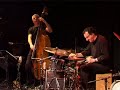 agust� fern�ndez -- piano?
barry guy -- double bass?
ram�n l�pez -- drums and percussion


think agust� fernandez meets barry guy and you're probably thinking of the kind of deluge of molten lava that characterised the spanish pianist's volcanic contribution to guy's oort-entropy back in 2005, or his spectacular scrap with mats gustafsson on critical mass. add wildcard dynamo percussionist ram�n l�pez to the mix and you've got all the makings of a fire music trio of epic proportions, right?

recorded at jazzclub moods, zurich, march 16, 2007.
cameras, editing and dvd-production: j�rg and marianne rufer.
audioengineer: willy srehler, klangdach.
a dingo and fox production

�2008, maya recordings

for more information see:
www.maya-recordings.com
www.intaktrec.ch