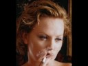 charlize theron is definately one of the best female star smokers i have ever seen if not the best thought i would share with the other smoke lovers