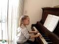 Amerie playing piano