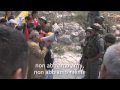 Al Masarah - Israelian soldiers attack a non-violent Palestininan demonstration against the wall