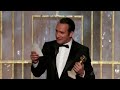 jean dujardin winning a golden globe for his role of george valentin in the artist january 2012.