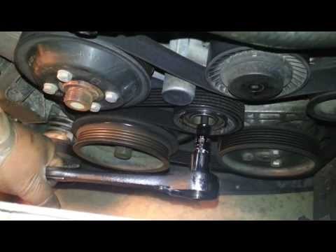 how to change the fan belt on bmw 318i