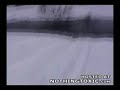 Some idiot on a snowmobile crosses a river then slams into a tree that is right in front of him.