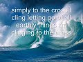 Tim Hughes clinging to the cross