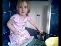 Olivia cutting up veg with daddy