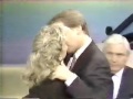 Pat Sajak kisses Vanna White