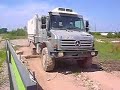 Unimog powering over logs