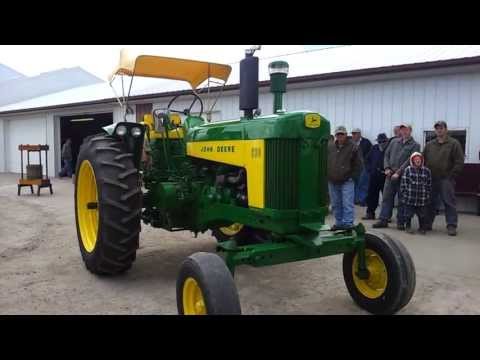 Iowa - Machinery Pete highlights a parade ready 1960 John Deere 630 tractor sold on a May 11, 2013 auction in Wellman, IA. Sale by Duwa's Auction Service.