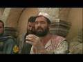 Afghans react to news of US surge