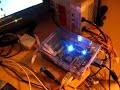 it is a custom board with an altera ep3c16 fpga, 8mb of ssram, a vga output, stereo audio and configuration trough usb