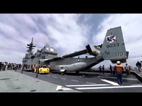 Raw: Marines Land Osprey on Japanese Ship