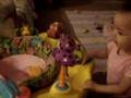 Anevay throwing her toys in her bucket..