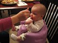 Eden's first experience with solids... SWEET POTATOES! whoohoo! :)