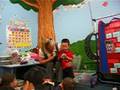 michael --(2 years 2 mons) sharing toys with classmates
