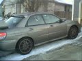 WRX STI with stock tires trying my snowy driveway