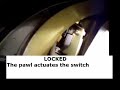 Overwing emergency exit flight lock system