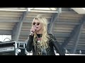taylor momsen on stage saturday 05/01/10 at bamboozle nj with her band the pretty reckless, is about to throw up several times.