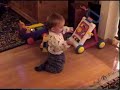 Christian moonwalking - moonsliding - 1 year old - binky trick Christian moonwalking - moonsliding - 1 year old - binky trick
