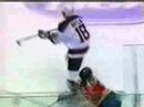 Scott Niedermayer hits Peter Worrell with his stick