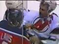 Scott Niedermayer hits Peter Worrell with his stick