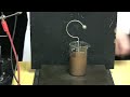 Leyden Jars, an early style of capacitor, can be connected to the two electrodes of the Wimshurst Machine. They will store charge as it is generated, giving a much stronger spark across the gap. Next we have a three-piece dissectible Leyden Jar consisting of two metal cups separated by a glass cup. When charged with the Wimshurst machine, we see by touching it with the shorting rod that it holds a large amount of charge. However, when disassembled, the metal cups can be brought into contact ...