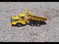 this is my marx big job dump truck. i don't see many of these toys in working condition anymore, so take a moment and enjoy this classic toy in action. i got my first one on christmas day 1964. this toy was on everybody's x-mas list that year. 
**please don't panic! a parts truck was used in the gravel scene. (the only function that works on it is dumping.) i would never put a mint condition toy in harms way.** joe v.
i have big job instructions and a limited number of reproduction battery covers and terminals available!!
contact me if you are interested!