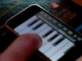 Fluorescent Adolescent playing on iPhone Piano Fluorescent Adolescent playing on iPhone Piano