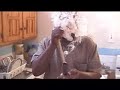 this a video of the ceremonial chalice pipe, mostly used by rastas in their spiritual gatherings.  however, in this case, this individual is sending a video message to his brothers and sisters abroad.
