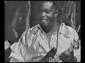 franco in 1975 playing his guitar in his own style of several years before. a one-off, never recorded, so wuta mayi, josky kiambukuta and youlou mabiala had to read the lyrics off a note. not to be judged without some understanding of the historical context. mobutu regularly made franco 