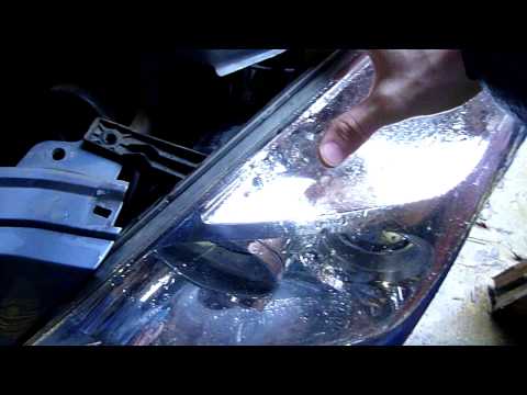 How To Change Headlight On A Kia Sedona