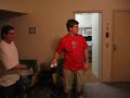 Two regular guys playing nintendo\