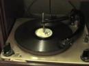 i demonstrate the functions of a cm stereo console from the 50's. 78 rpm record playing is the aurthur smith trio doing cheatham county breakdown