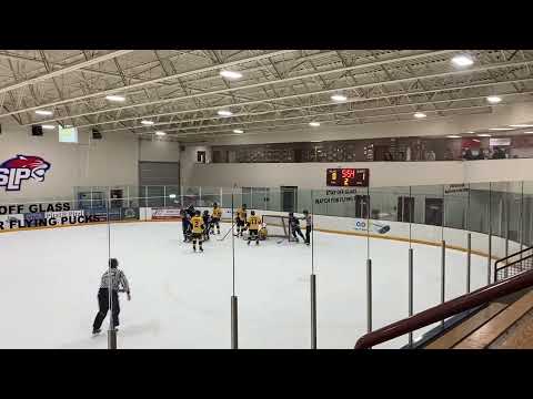 Gianni Annicchiarico blue # 11  close up goal, playing till the whistle,  NAPHL showcase 2022