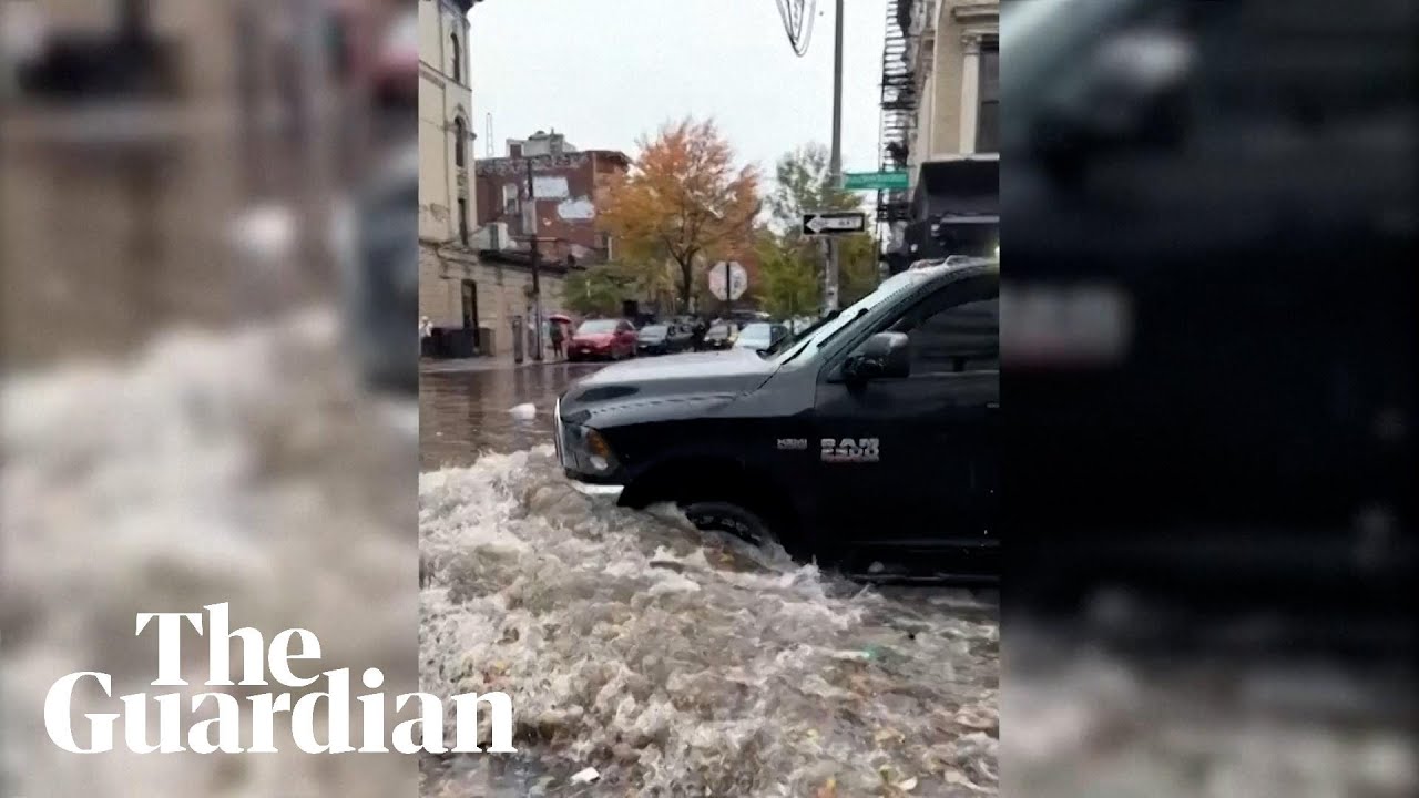 Heavy rain floods streets in New York City