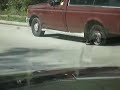 MUD FLAP - MAN DRIVES TRUCK ON RIM www.WallyButler.com
